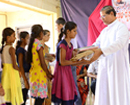 Free uniform and books distributed to new students in St. Lawrence Kannada Medium HS